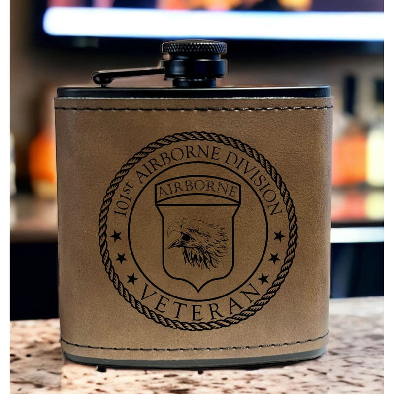 Sadd;e Brown leather wrapped black stainless steel 6oz Flask featuring the 101st Airborne Veteran logo
