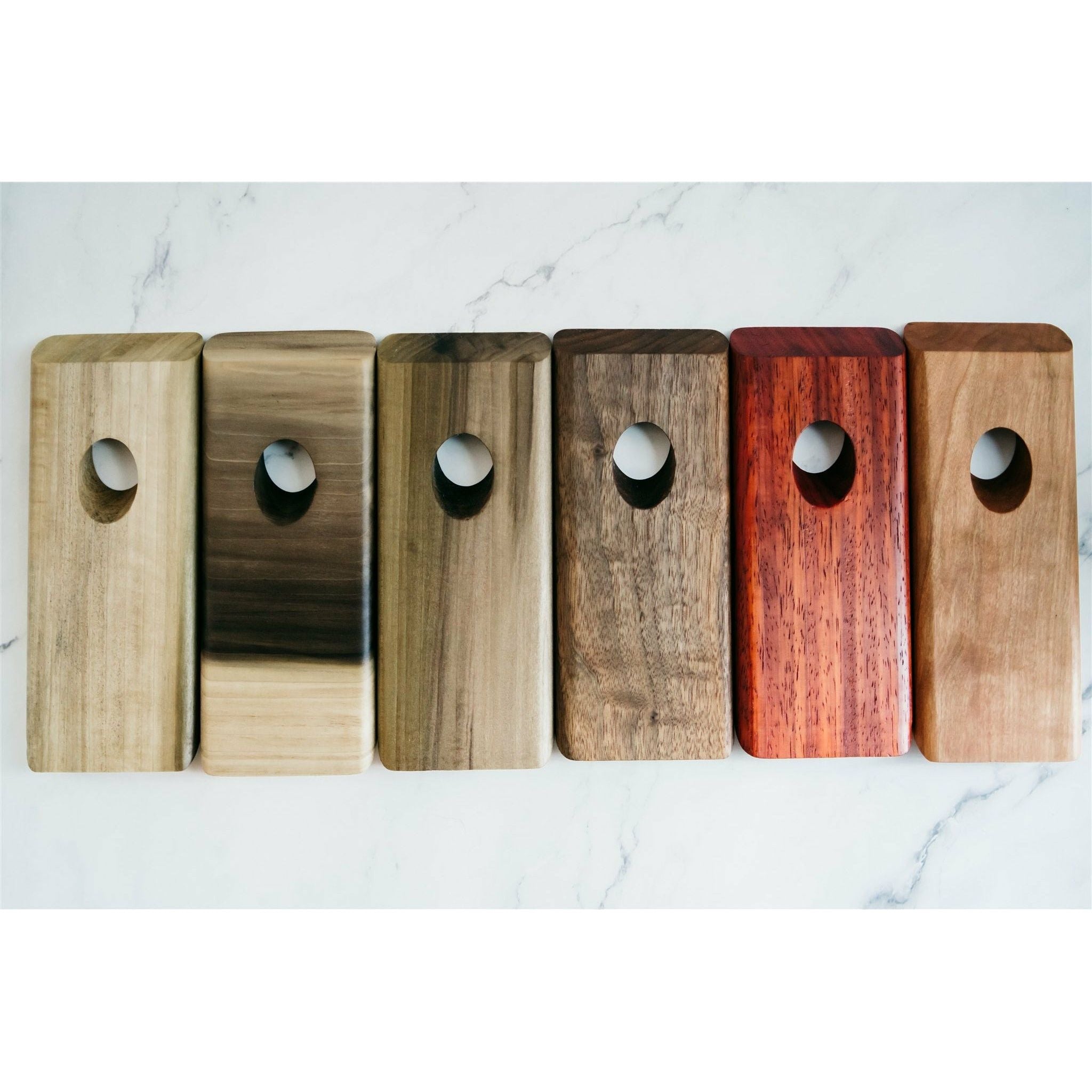 Multiple species of wooden floating wine bottle holder